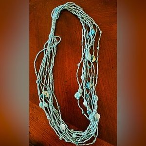 Turquoise color beaded necklace w/multiple strands beads & shell & stone beads